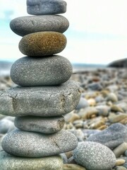 Naklejka na ściany i meble stack of zen stones on Cei bach beach