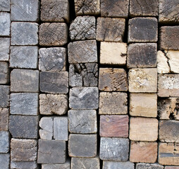 Timber cut into square shape in a warehouse.
