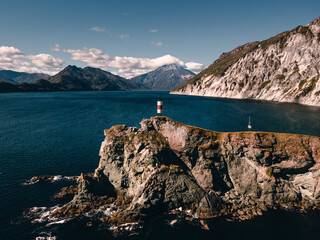 volcano ocean lighthouse 
