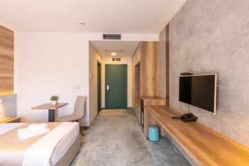 Interior of a double bed hotel bedroom in luxury hotel