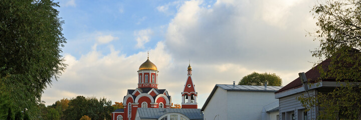 christian church and autumn leaves