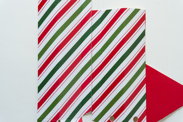striped cardboard with red triangle