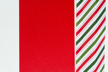 candy cane striped cardboard with space on red