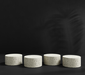 four cylinders and black background