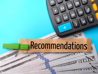 Banknotes and calculator with word recommendations.