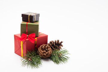 Christmas and New Year composition. Gift boxes with holiday packaging and decorations on a white background