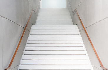 Stairway to the light.Stairs.steps motivation. Stairs in the hotel interior design.White Stone stairway.concept for motivation start, opportunity, architecture design.Background business challenge.