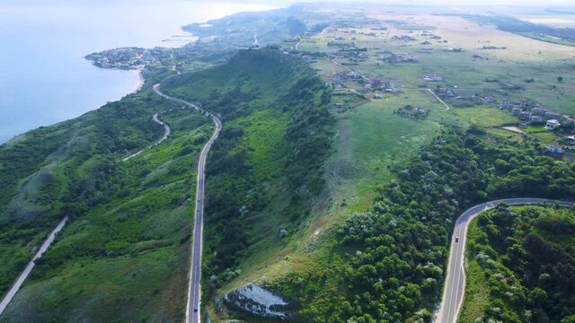 Aerial of gorgeous rural coastal town on a hill in Topola, Bulgaria. Balchik