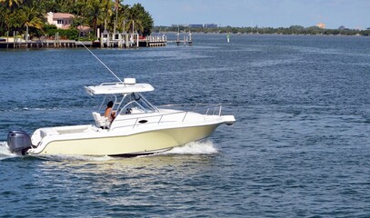 Sport fishing boat on the Florida `intra-Coastal off of Rivo Alto island in Miami Beach.