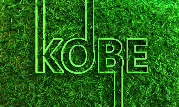 Kobe city name in geometry style design with green grass