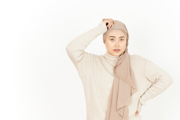 Thinking and confused of Beautiful Asian Woman Wearing Hijab Isolated On White Background