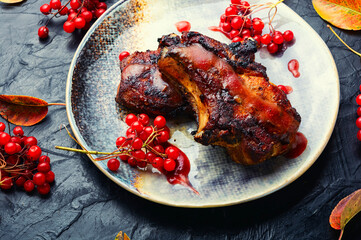 Grilled meat with viburnum