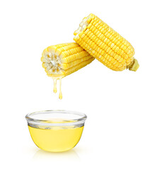 Fresh corn with corn oil drop dripping to glass bowl isolated on white background.