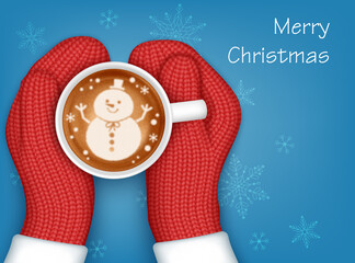 Hands in knitted mittens holding a cup of coffee. Christmas greeting card template