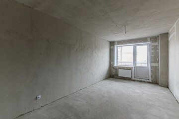 Russia, Moscow- May 03, 2020: interior room apartment rough repair for self-finishing. interior decoration, bare walls of the premises, stage of construction