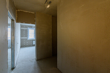 Russia, Moscow- May 03, 2020: interior room apartment rough repair for self-finishing. interior decoration, bare walls of the premises, stage of construction
