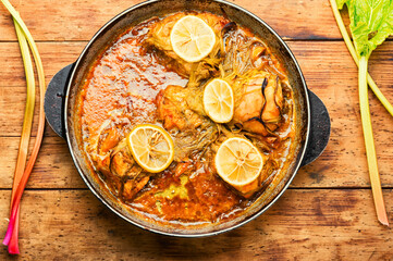 Appetizing chicken breast baked with rhubarb
