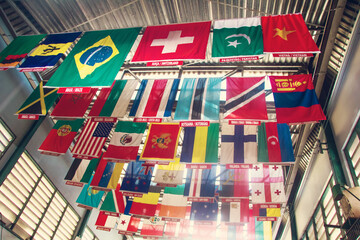 Flags of different countries. International flagstaff