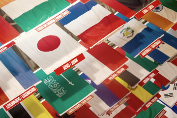 Fototapeta na wymiar Flags of different countries. International flagstaff