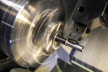 Machining parts on a lathe. A vice clamp the workpiece, which sharpens the cutter.