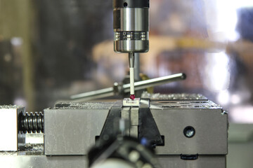 Probe for reference to the coordinate system on the workpiece on a milling machine.