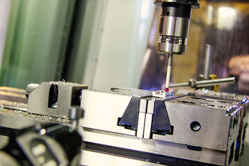 Probe for reference to the coordinate system on the workpiece on a milling machine.