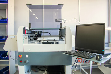 Factory for the electronic production. Technological process of soldering and assembly chip components on pcb board. Automated soldering machine