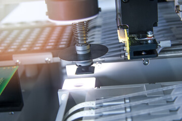 Factory for the electronic production. Technological process of soldering and assembly chip components on pcb board. Automated soldering machine inside
