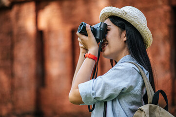 Young backpacker female travel in ancient site