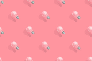 Light bulbs seamless pattern. Background on the theme of light bulbs and lighting.