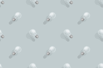 Light bulbs seamless pattern. Background on the theme of light bulbs and lighting.