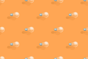 Light bulbs seamless pattern. Background on the theme of light bulbs and lighting.