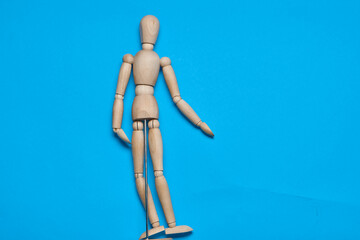 wooden man mannequin blue background design object