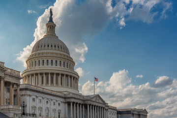 US Capitol Building with American flags, the Capitol is the home of the United States Congress in...