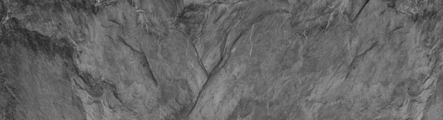 Abstract dark grey black slate background or texture.