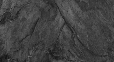 Gray grunge banner. Abstract stone background. The texture of the stone wall. Close-up.