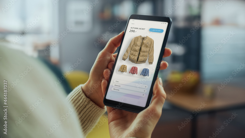 Poster beautiful caucasian female is using smartphone with clothing online web store to choose and buy jack