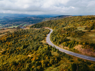 aerial view of speedway road in autumn carpathian mountains