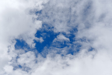 white clouds on blue blue sky on a summer day