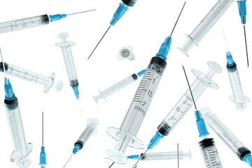 A cloud of flying 2ml sterile medical syringes with a blue needle. Isolated on a white background. Clipart. 3d rendering