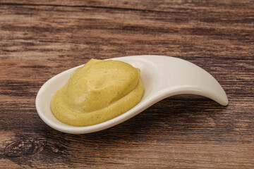 Dijon mustard sauce in the bowl