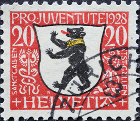 Switzerland - Circa 1928: a postage stamp printed in the Switzerland showing the city arms with a...