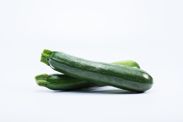 Green zucchinis isolated on white background 