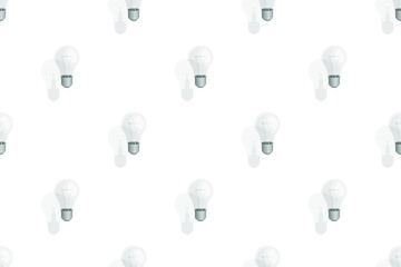 Light bulbs seamless pattern. Background on the theme of light bulbs and lighting.