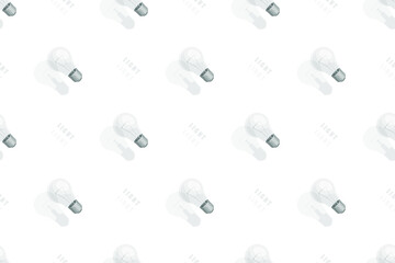 Light bulbs seamless pattern. Background on the theme of light bulbs and lighting.
