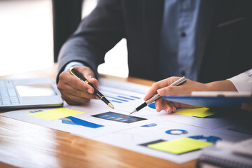 Team work with business analytic price chart on the table at the conference room.