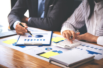 Team work with business analytic price chart on the table at the conference room.