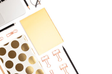 Layout of office supplies and laptop on a white background. Workspace for distance education.