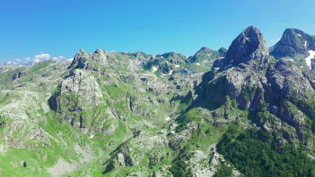 Prokletije mountains over the Grebaje valley, Montenegro. Aerial drone view.