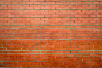 Brick wall texture background. Red brick wall wallpaper in vintage style. Orange background. Interior of brick building. Red brickwork. House construction industry background. Loft style house wall.